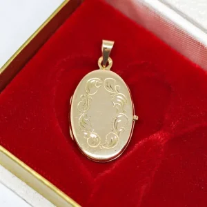 Söt medaljong med mönstergravyr